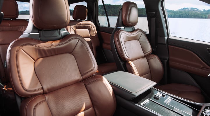 The front row's Perfect Position Seats in a 2024 Lincoln Aviator® Reserve model with Ebony Roast interior | Thornhill Lincoln in Chapmanville WV